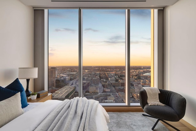 bedroom featuring a wall of windows