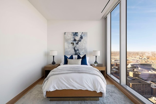 bedroom featuring hardwood / wood-style flooring