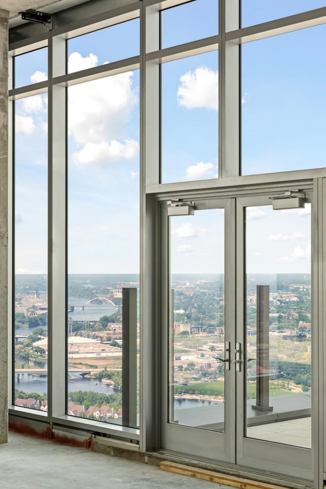 doorway to outside with plenty of natural light and french doors