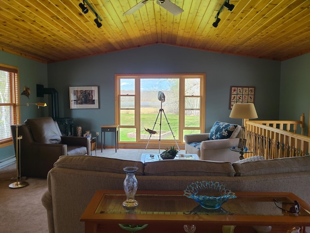 living room with wood ceiling, vaulted ceiling, ceiling fan, and carpet floors