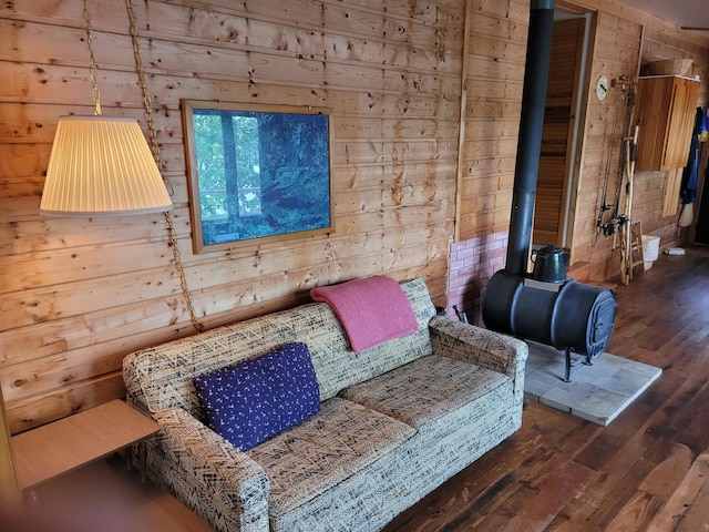 interior space with wood walls and dark wood-type flooring