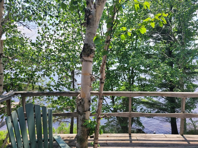 deck featuring a water view