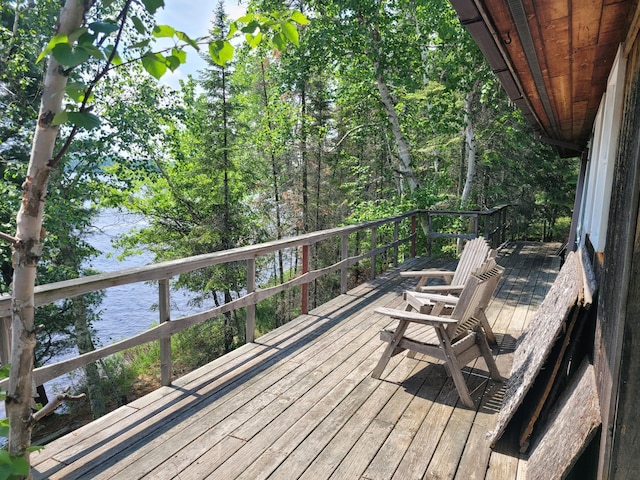 deck featuring a water view