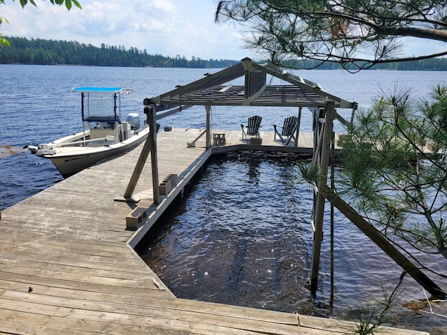 view of dock with a water view