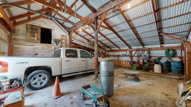 garage featuring wooden walls