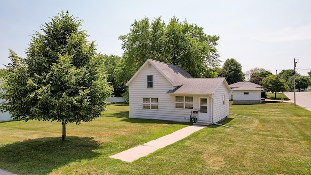 view of front of home with a front yard