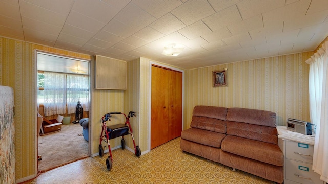 living room featuring light carpet