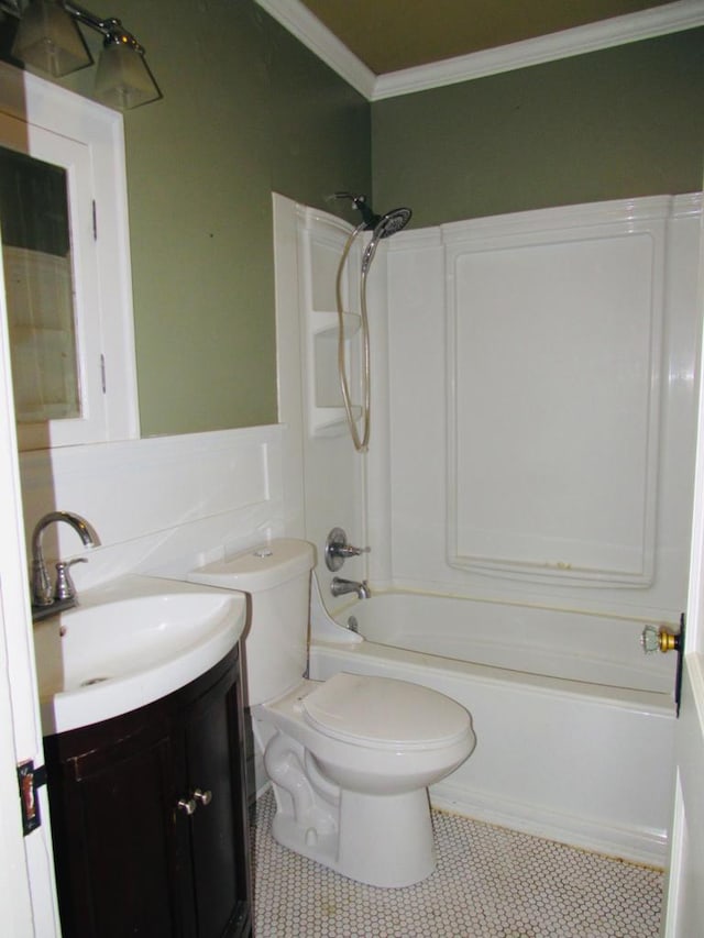 full bathroom featuring toilet, ornamental molding, tile flooring, vanity, and bathtub / shower combination