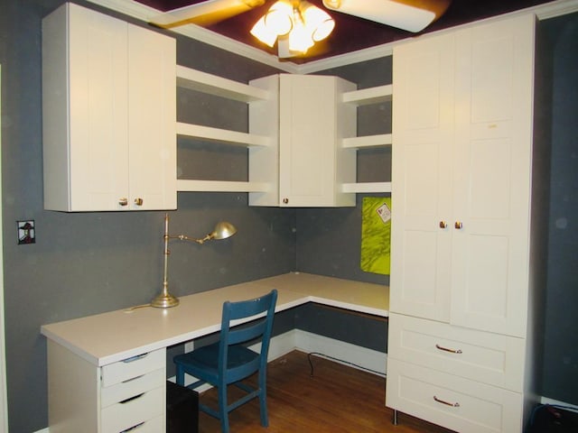 office with dark hardwood / wood-style flooring, ceiling fan, and ornamental molding