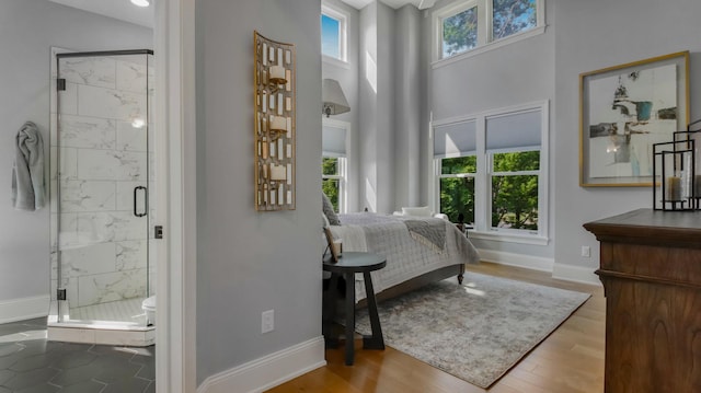 bedroom featuring hardwood / wood-style floors