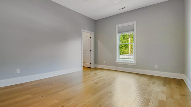 empty room with light wood-type flooring