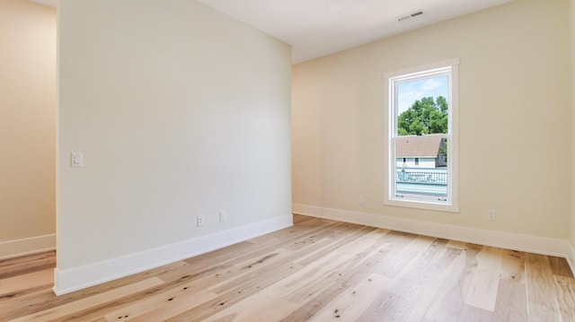 empty room featuring light hardwood / wood-style floors