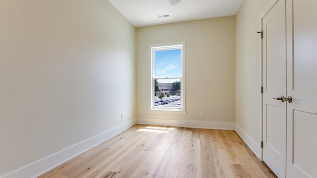 unfurnished bedroom with light wood-type flooring