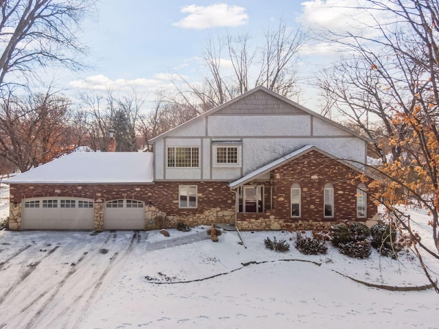 view of front of property with a garage