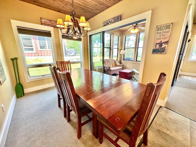 dining room with wood ceiling, ceiling fan with notable chandelier, and carpet