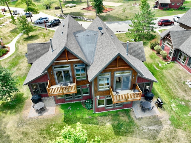 exterior space featuring a deck and a fire pit