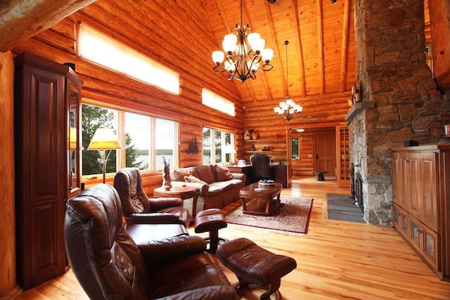 living room with wooden ceiling, a notable chandelier, light wood-type flooring, a fireplace, and rustic walls