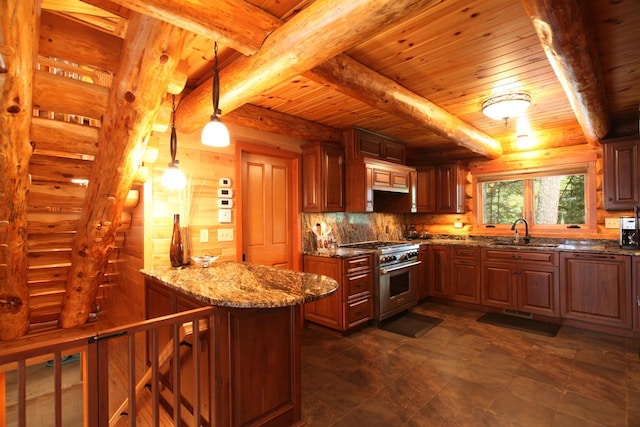 kitchen featuring sink, log walls, dark stone counters, stainless steel stove, and hanging light fixtures