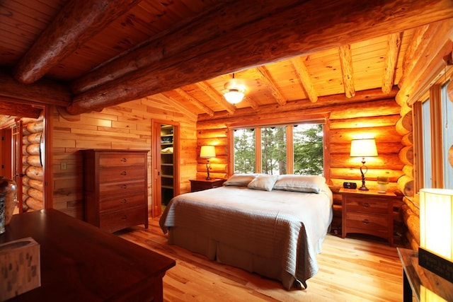 bedroom with wood ceiling, log walls, vaulted ceiling with beams, and light hardwood / wood-style flooring