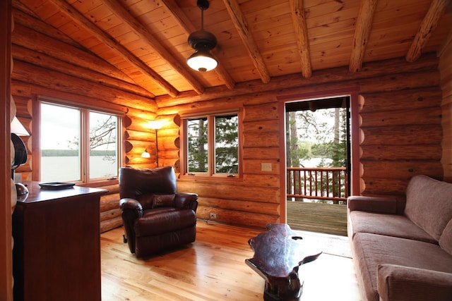 living room featuring light hardwood / wood-style flooring, rustic walls, wooden ceiling, and a healthy amount of sunlight