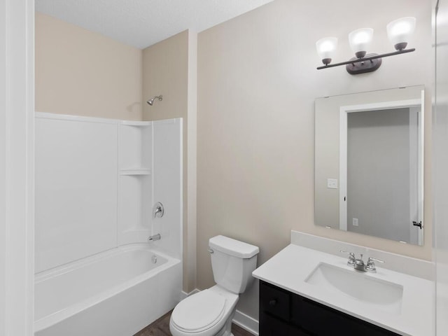 full bath featuring  shower combination, vanity, and toilet