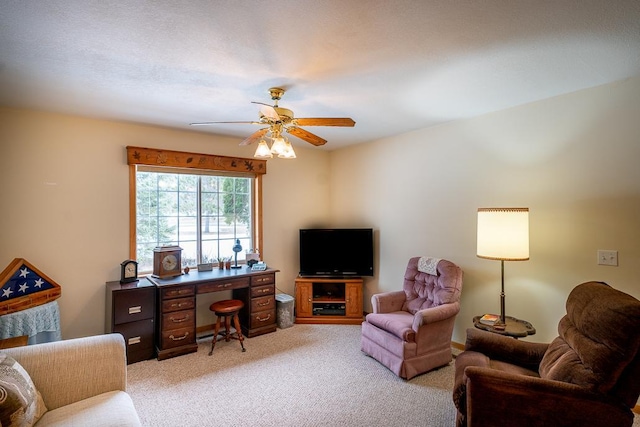 office area with light colored carpet and ceiling fan