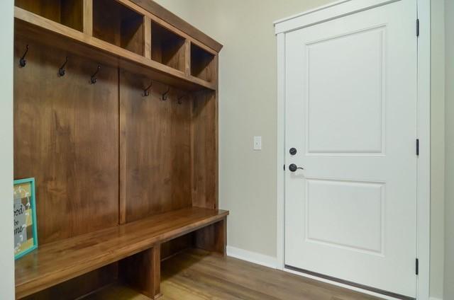 mudroom with wood-type flooring