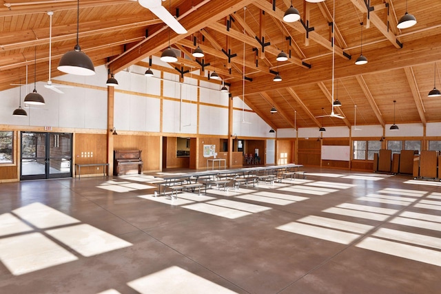 interior space featuring french doors, high vaulted ceiling, wood ceiling, and beam ceiling