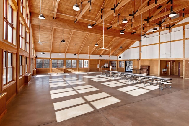 miscellaneous room featuring high vaulted ceiling, wooden ceiling, and beamed ceiling