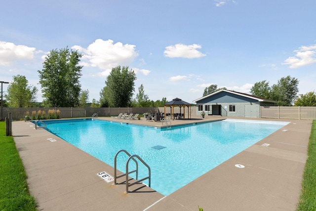 view of pool with a patio area and a gazebo