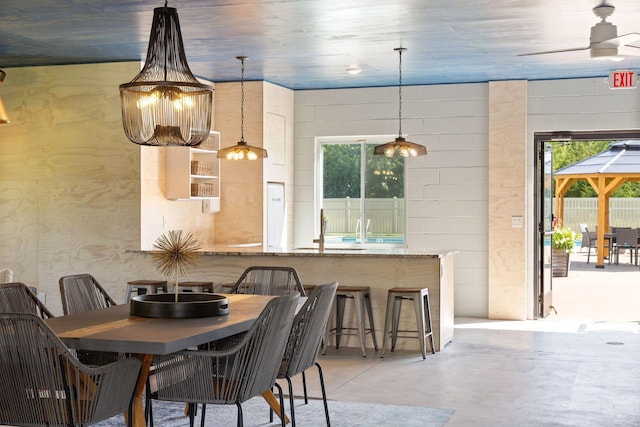 dining space with ceiling fan