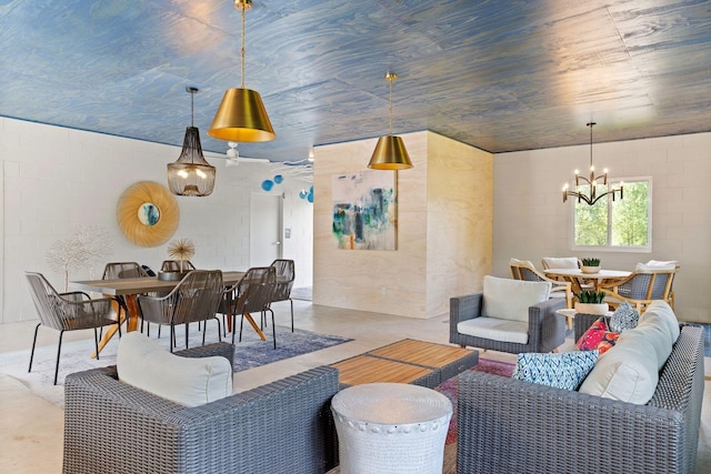 living room with a notable chandelier