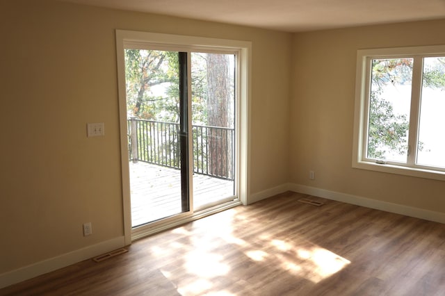 interior space featuring plenty of natural light and light hardwood / wood-style floors