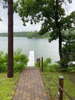 dock area featuring a water view