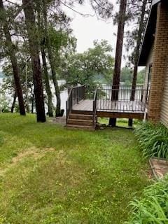 view of yard featuring a wooden deck