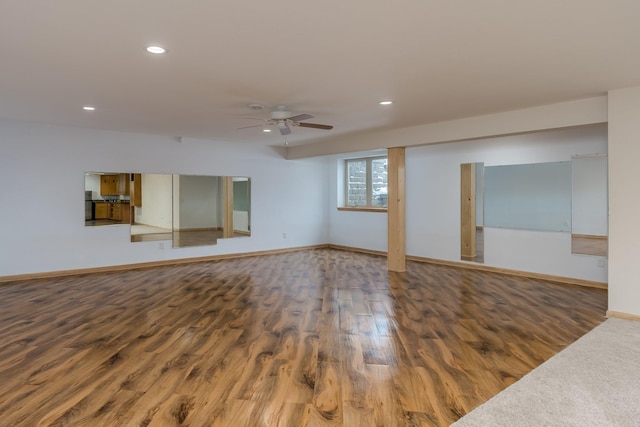 unfurnished room with hardwood / wood-style flooring and ceiling fan