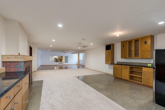 kitchen with stainless steel fridge and ceiling fan