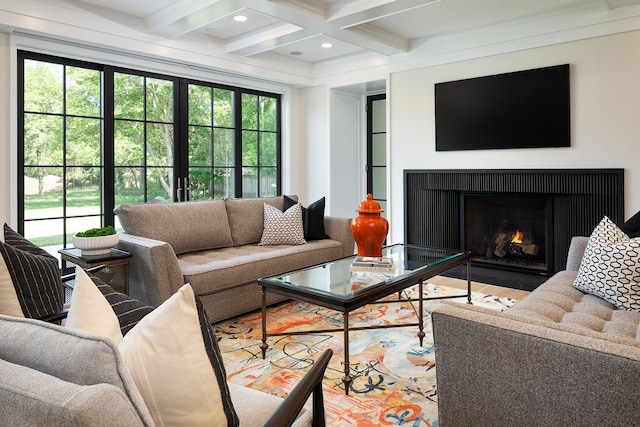 living room with french doors, ornamental molding, light hardwood / wood-style flooring, coffered ceiling, and beam ceiling