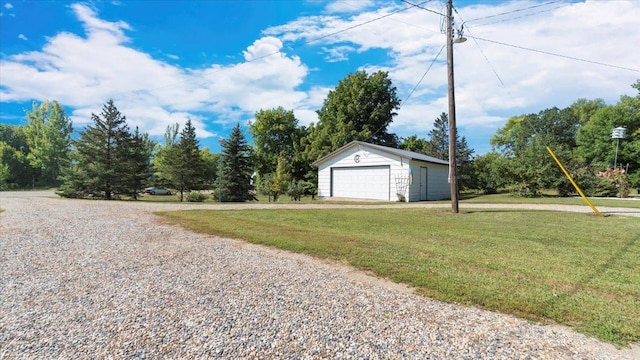 garage with a lawn