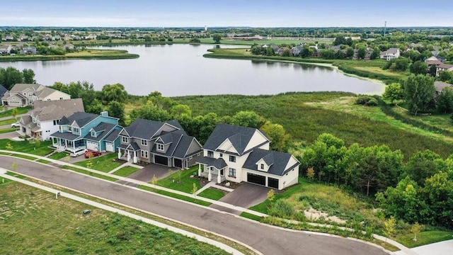 birds eye view of property featuring a water view