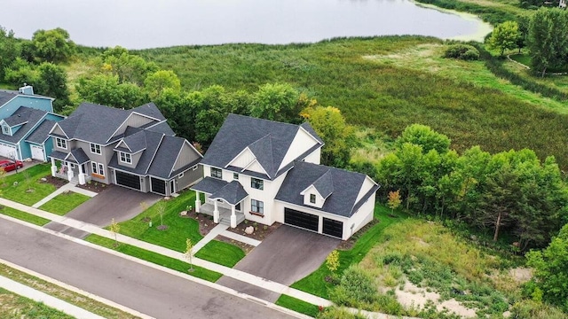 drone / aerial view with a water view