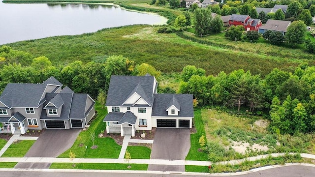 drone / aerial view with a water view