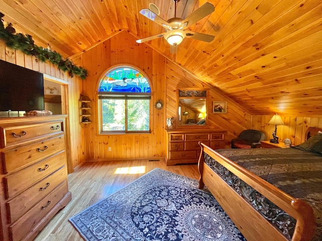 29724 387th St, Waubun, MN 56589 - bedroom featuring vaulted ceiling, wood walls, wooden ceiling, and light wood-style flooring