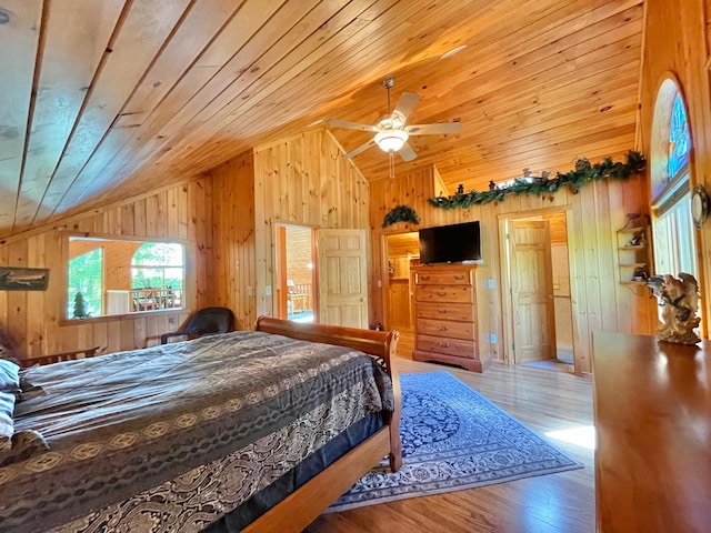 29724 387th St, Waubun, MN 56589 - bedroom featuring lofted ceiling, wood walls, wood ceiling, and wood finished floors