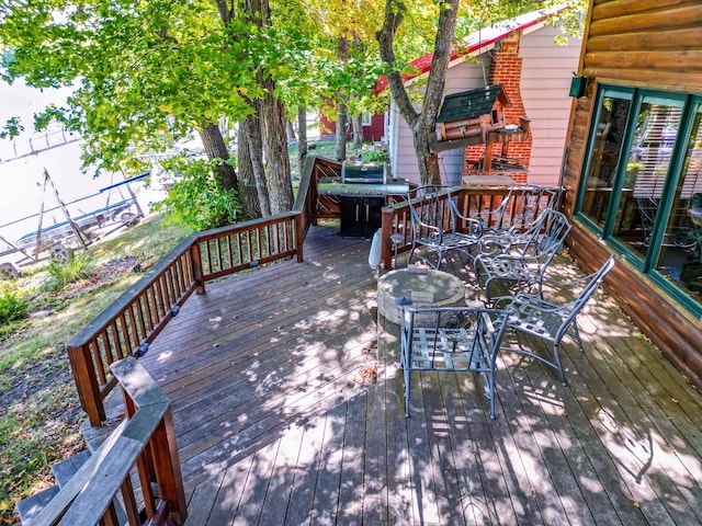 29724 387th St, Waubun, MN 56589 - wooden deck with outdoor dining space