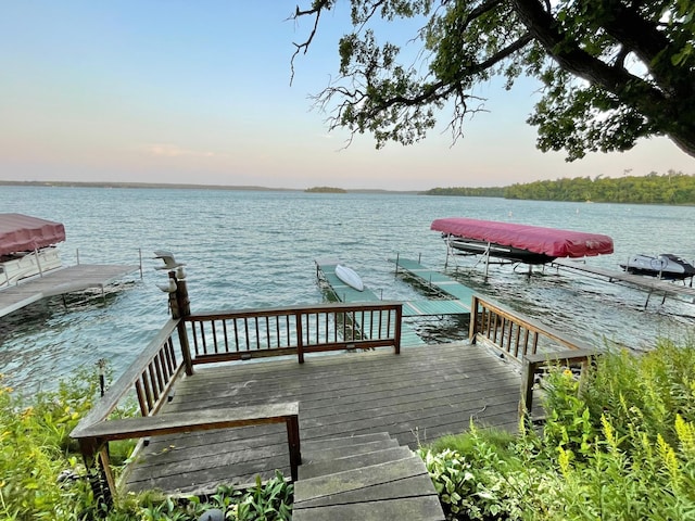 29724 387th St, Waubun, MN 56589 - dock featuring a water view and boat lift
