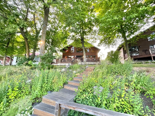 29724 387th St, Waubun, MN 56589 - view of yard with stairs and a porch