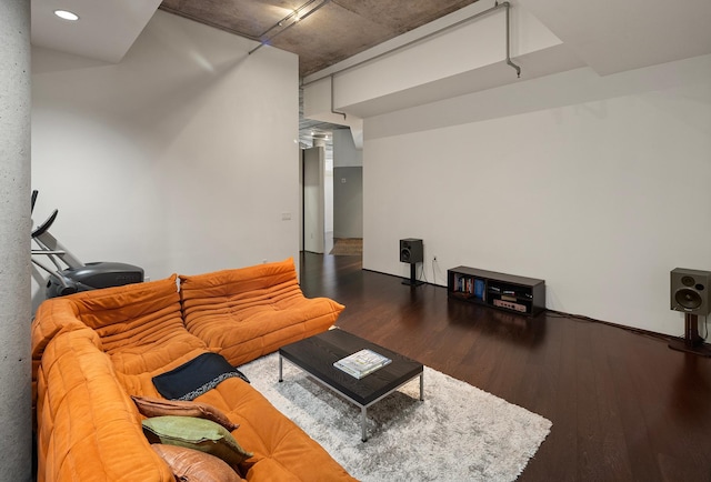 living room with dark hardwood / wood-style flooring