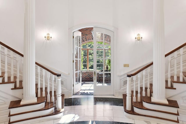 17950 Breezy Point Rd, Woodland, MN 55391 - entrance foyer featuring stairs and a high ceiling