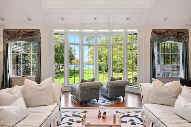 17950 Breezy Point Rd, Woodland, MN 55391 - sunroom / solarium featuring wood finished floors and a water view
